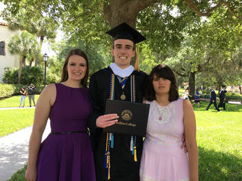 My brother, my sister and I at my brother's college graduation